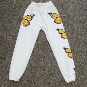 Bright white sweatpants from Fashion Nova with beautiful orange butterflies!